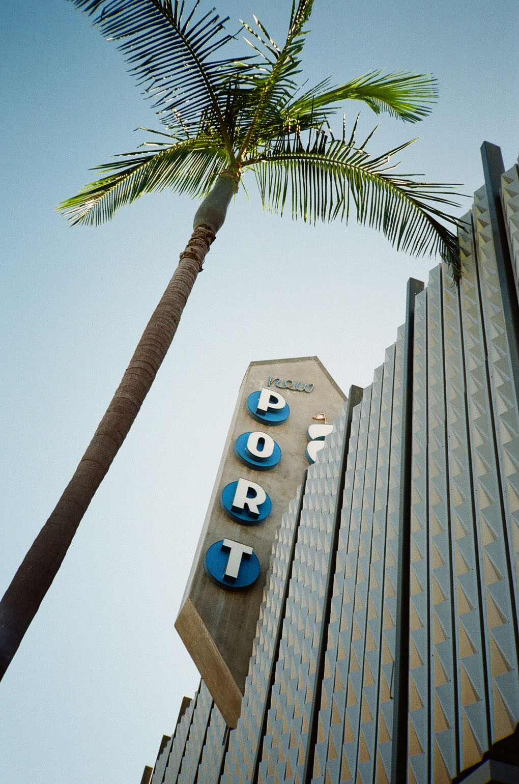 A retro storefront: New Port Theater